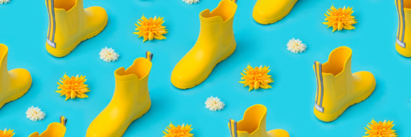 Cirrus Kids Chelsea Rain Boots in School Bus repeating with yellow and white flowers between